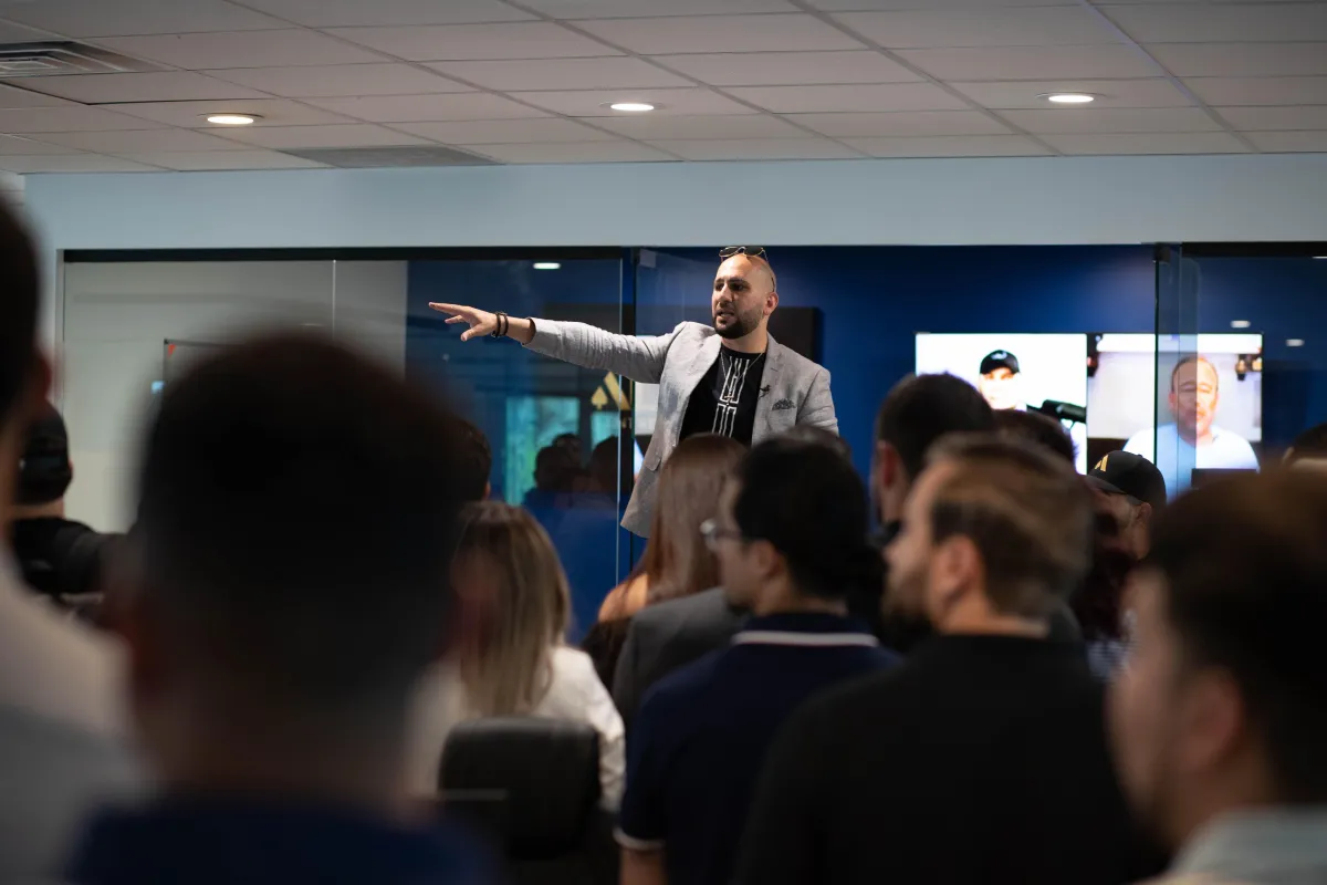Sal speaking at one of his live events